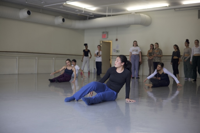 Dance students in mid-practice during a dance class